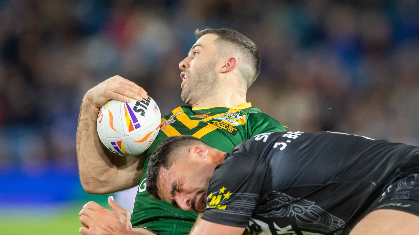 Australian James Tedesco is tackled by New Zealand's Jesse Bromwich. Photo / Photosport
