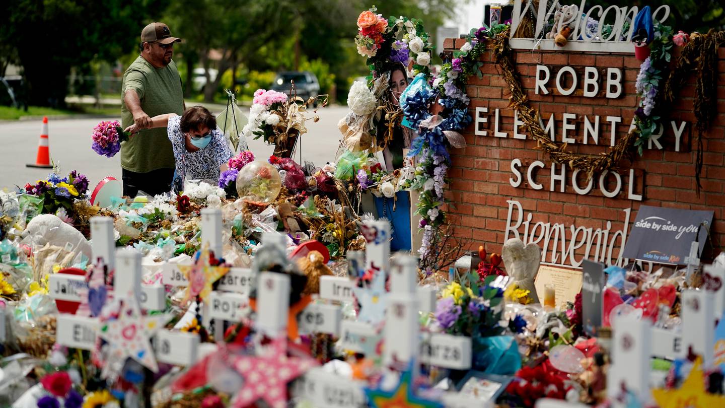Retired teachers Raul Noyola and Ofelia Noyola visit a memorial honouring the school shooting victims at Robb Elementary in Uvalde, Texas. Photo / AP