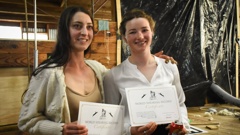 Shearers Megan Whitehead (left) and Hannah McColl after their world record was confirmed in the Grant Brow woolshed near Gore. Photo / Charly