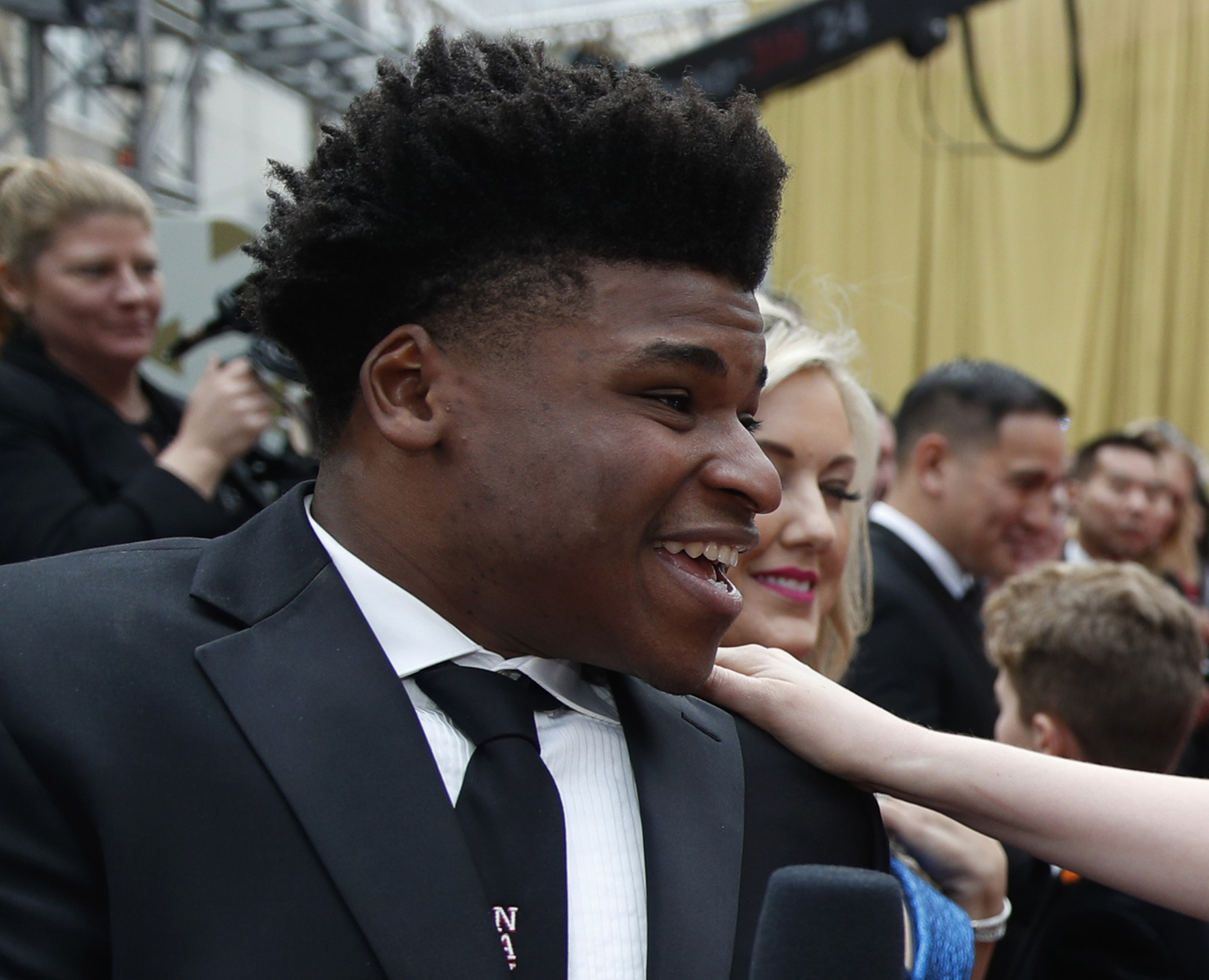 Jerry Harris talks to an actress on the red carpet at the Oscars at the Dolby Theatre in Los Angeles. Photo / AP