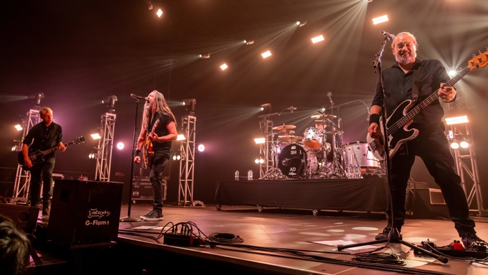 Phil Knight, Jon Toogood, Tom Larkin and Karl Kippenberger of SHIHAD perform at Spark Arena on March 14, 2025 in Auckland, New Zealand. (Photo by Dave Simpson/WireImage)