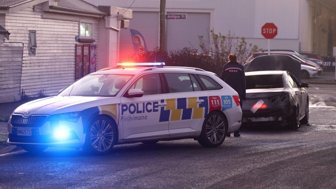 A fire broke out in a car in Christchurch this morning. Photo / George Heard
