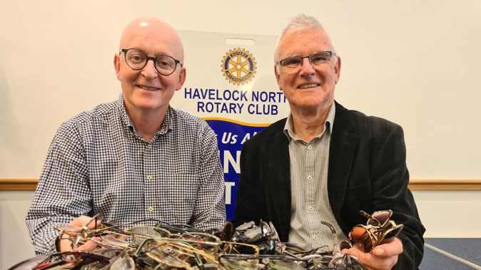 Hastings optometrist Niall McCormack (left) with Havelock North Rotary Club Rotary Foundation chairman Peter Mayne and some of more than 1300 pairs of glasses for Tanzania. Photo / Supplied