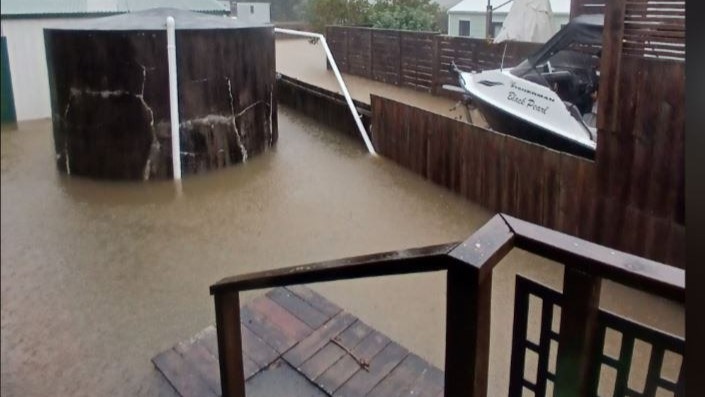 Four regions placed under red heavy rain warnings, Coromandel highway flooded