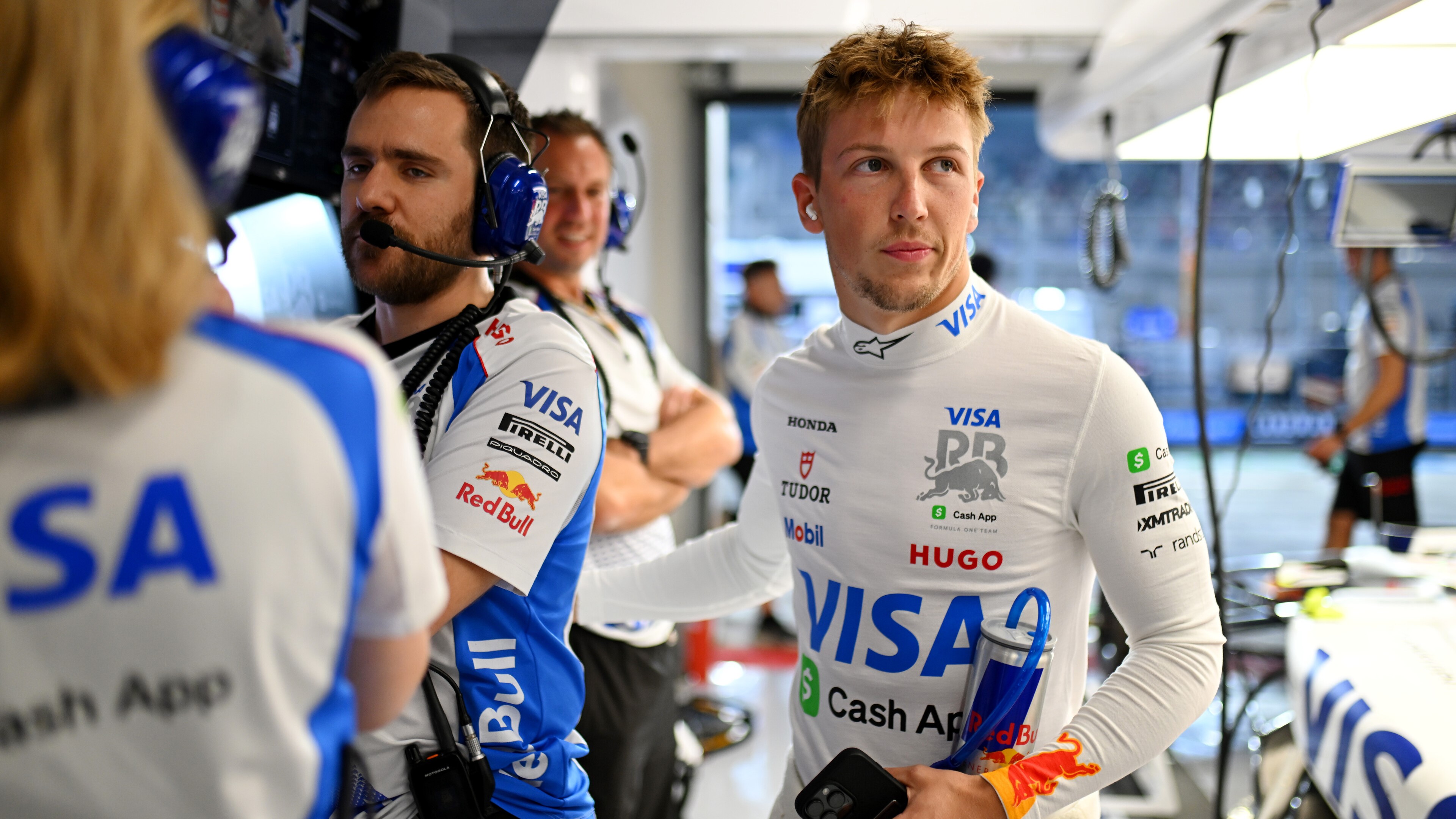 Liam Lawson of New Zealand and Visa Cash App Racing Bulls looks on in the garage during Sprint Qualifying ahead of the F1 Grand Prix of Qatar at Lusail International Circuit on November 28, 2025 in Lusail City, Qatar. (Photo by Rudy Carezzevoli/Getty Images)