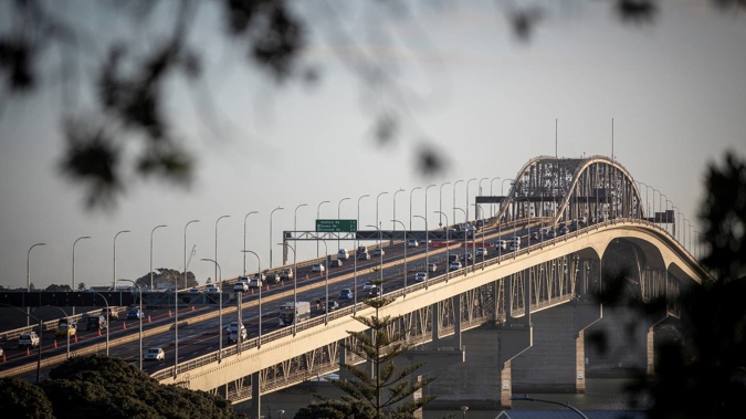 Waka Kotahi has ruled out a lane of the Auckland Harbour Bridge being used by cyclists. (Photo / Michael Craig)