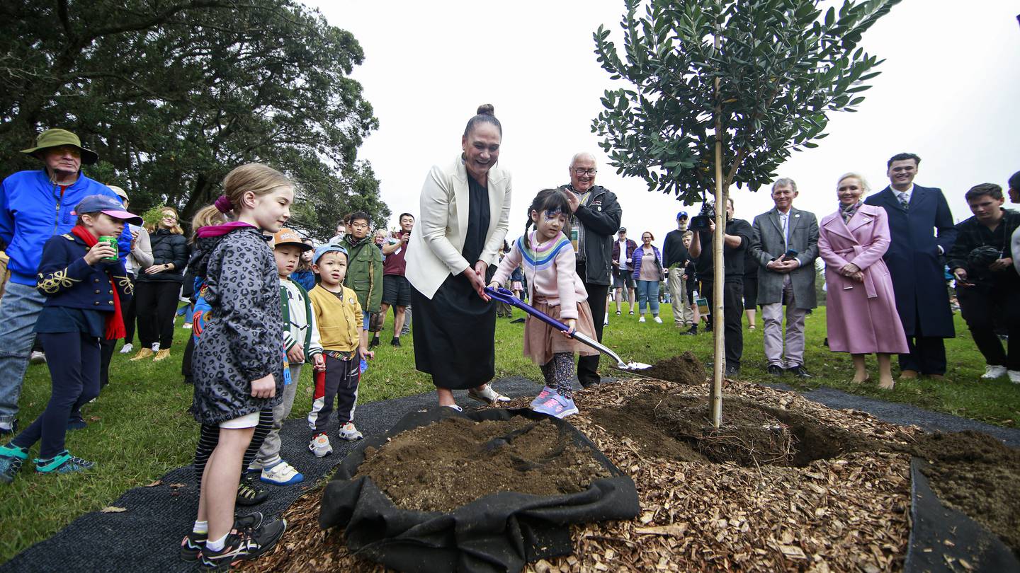 Acting Prime Minister Carmel Sepuloni plants a native tree to celebrate the coronation of King Charles III in the Auckland domain as part of the nationwide planting effort in honour of the coronation. Photo / Alex Burton