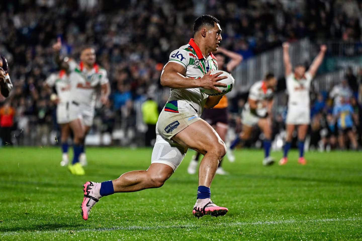 Roger Tuivasa-Sheck runs in for a try against the Broncos. Photo / Photosport