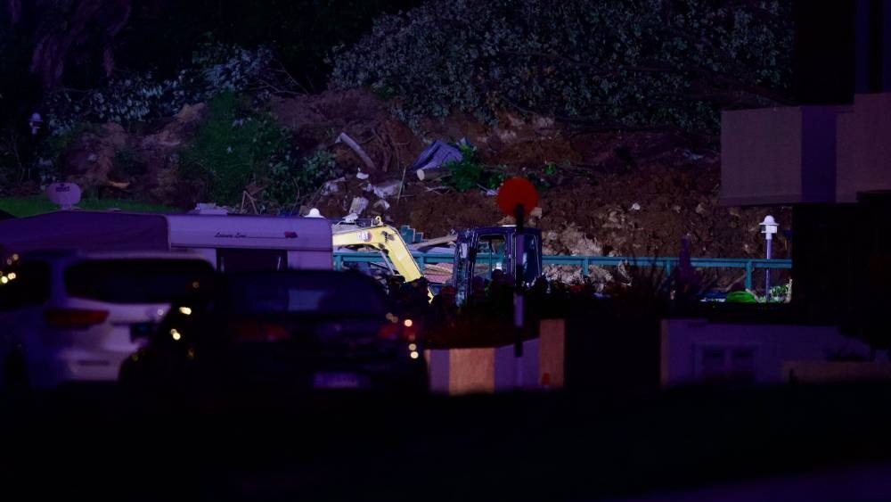 Anxious families gather at campground awaiting news of missing loved ones as search enters day 2