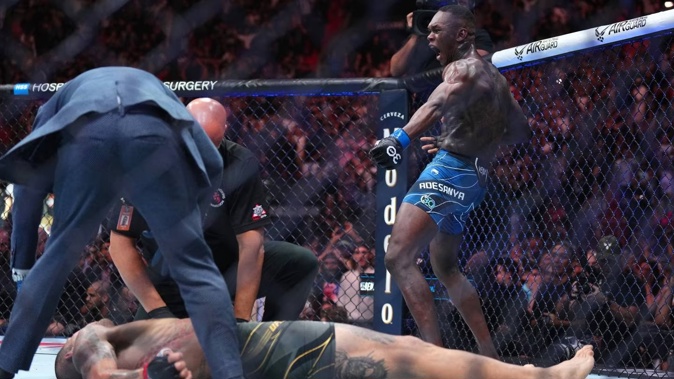 Israel Adesanya of Nigeria reacts after knocking out Alex Pereira of Brazil in the UFC middleweight championship fight during the UFC 287 event. Photo / Getty