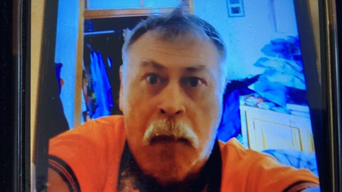 A still from the video showing Paul Endicott setting the camera on his mobile phone to record before he covertly filmed his wife naked without her consent. Photo / Supplied