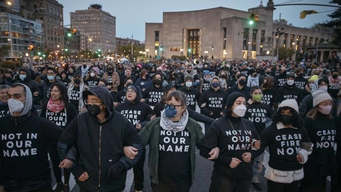 Protesters block traffic during a pro-Palestinian demonstration demanding a permanent cease-fire in Gaza, near the home of Sen. Chuck Schumer in the Brooklyn borough of New York, Tuesday, April 23, 2024. (AP Photo/Andres Kudacki)