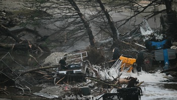 Watch: House floats down river in Texas flash flood