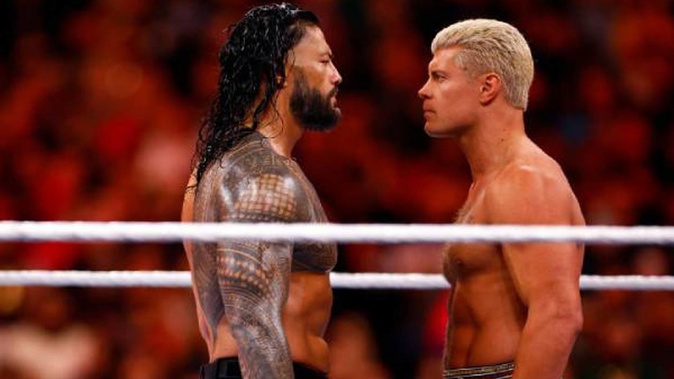 WWE stars Roman Reigns and Cody Rhodes in action durng the main event of Wrestlemania 39. Photo / Getty Images
