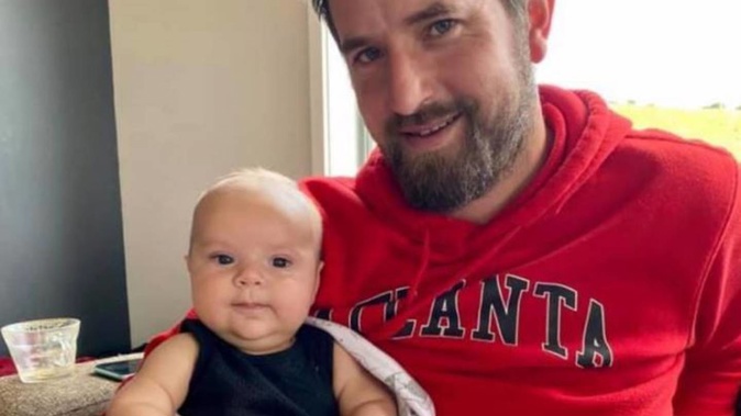 Michael Hales and son, Hunter, pictured in October last year. Hales is critically ill in hospital battling a mysterious infection. (Photo / Supplied)