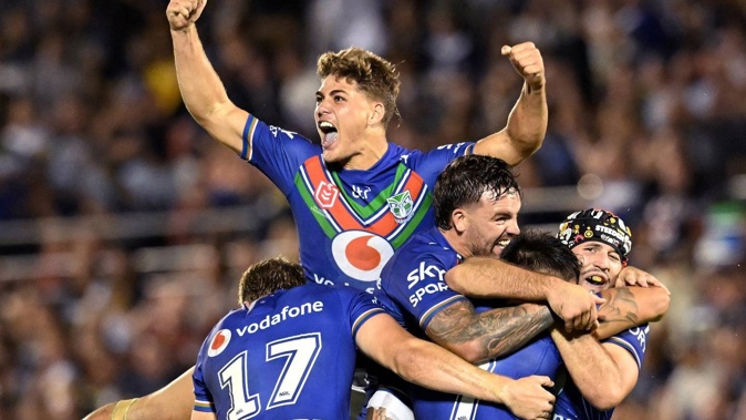 Reece Walsh and his Warriors teammates celebrate the golden point win over the Cowboys. Photo / Photosport
