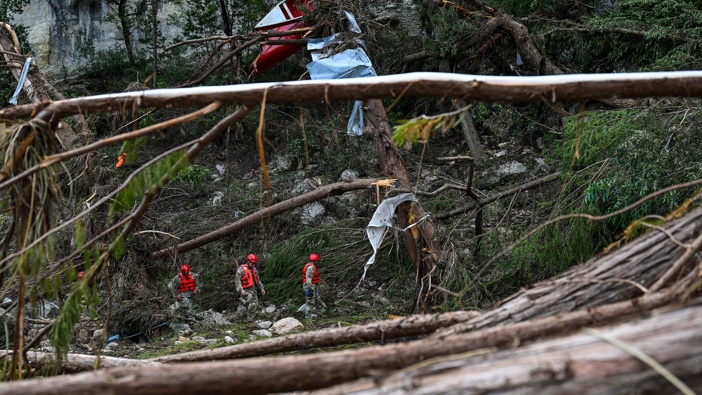 Search and rescue personnel continue to look for missing people along the Guadalupe River on July 7, 2025 in Hunt, Texas. (Photo by Joshua Lott/The Washington Post via Getty Images)