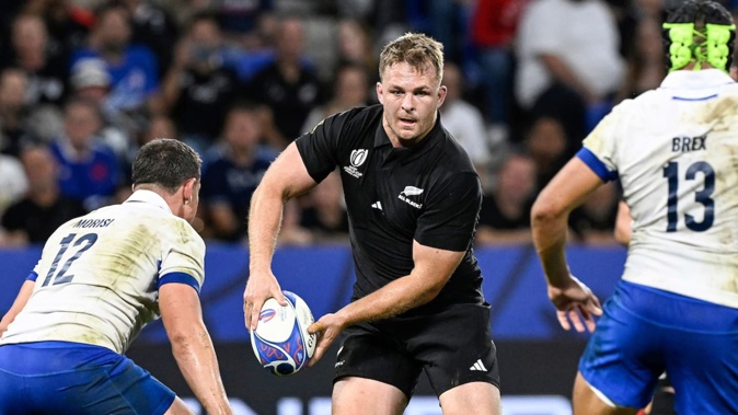 Sam Cane in action against Italy at last year's Rugby World Cup. Photo / Photosport