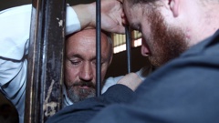 Antony de Malmanche with his son Shaun de Malmanche after his sentence. Photo / AP