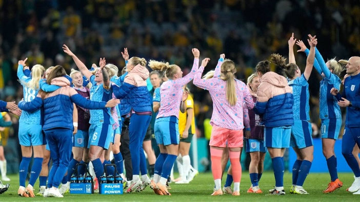 Members of team England celebrate after their win in the Women's World Cup semifinal match against Australia. Photo / AP