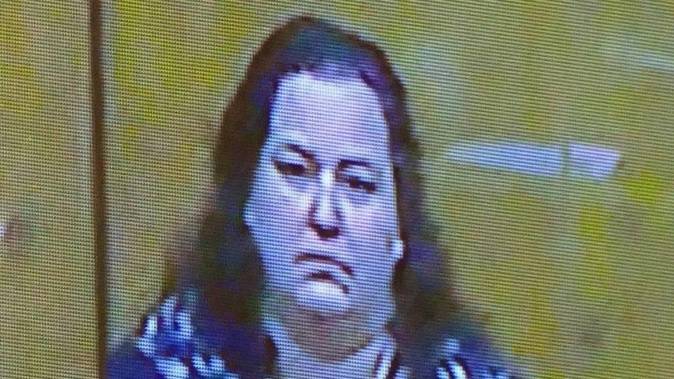 Sarah Day, appearing by video link, has been sentenced to 10 months' home detention for her cruel deception. (Photo / Rob Kidd)