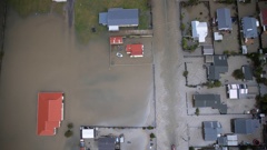 Flooding in Westport last year caused tens of millions of dollars of damage. Photo / George Heard