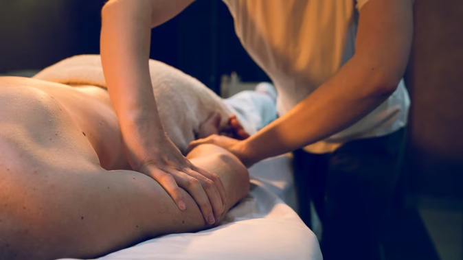 A woman was beaten up by a client when she wouldn't give him a refund 45 minutes into an hour-long massage. Photo / 123rf