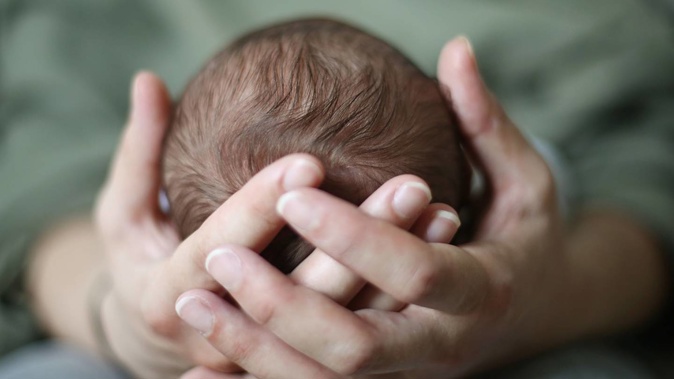 A baby was seriously injured, receiving nine fractures to his body. Photo / Getty Images.