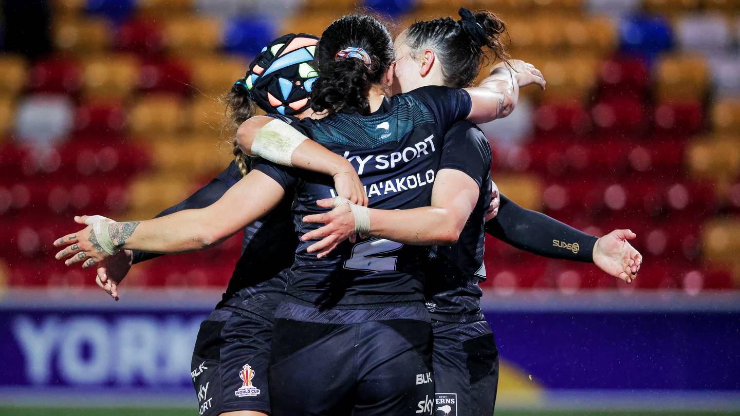 Kiwi Ferns players celebrate one of eight tries against France. Photo / Photosport