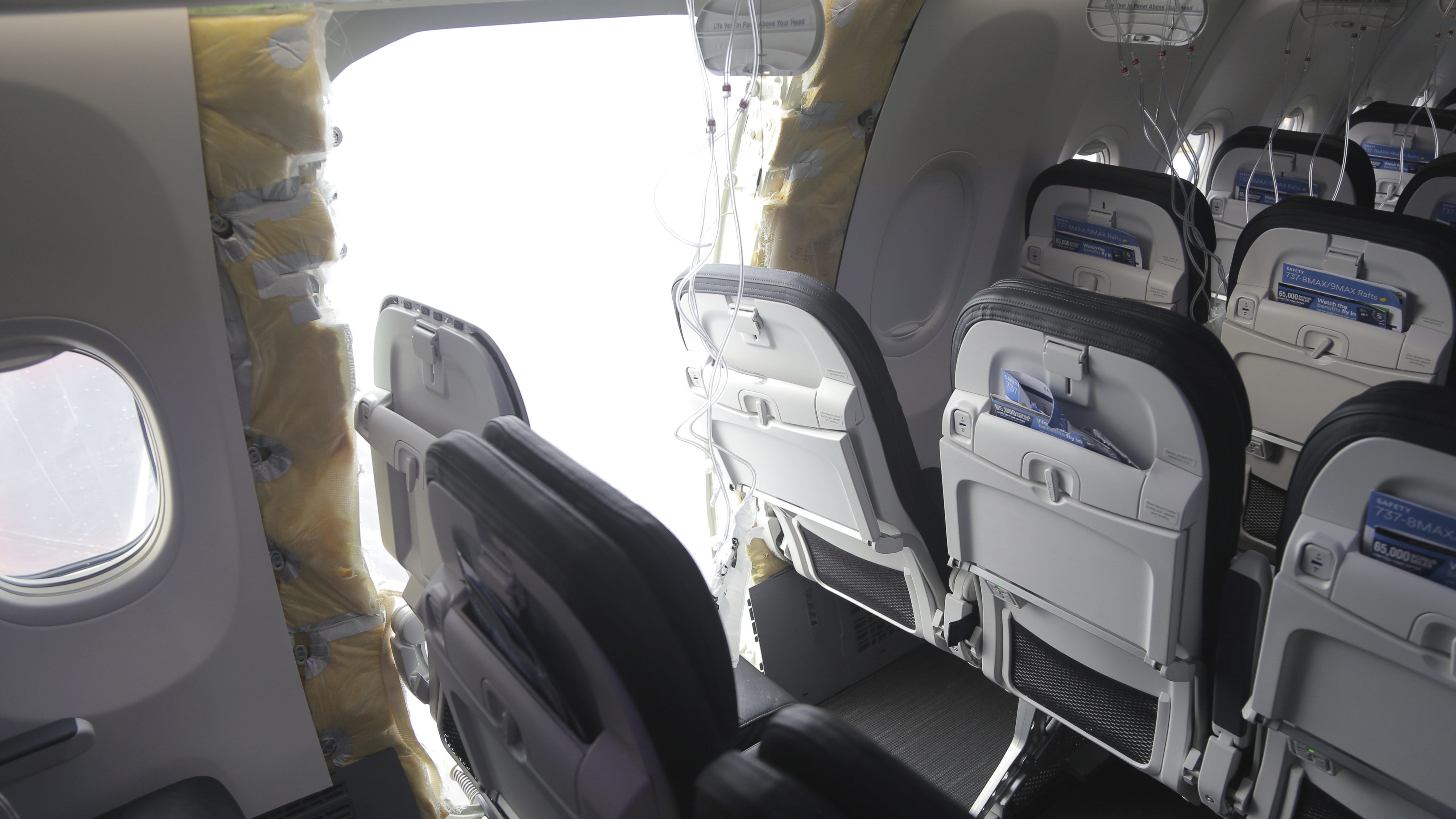 This image taken Sunday, Jan. 7, 2024, and released by the National Transportation Safety Board, shows a section of Alaska Airlines Flight 1282 that is missing panel on a Boeing 737-9 MAX in Portland, Ore. Photo / NTSB via AP