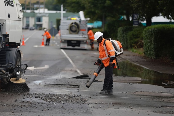 A burst water pipe has caused damage to Carbine Rd in Mt Wellington near Sylvia Park mall in Auckland. Photo / Michael Craig