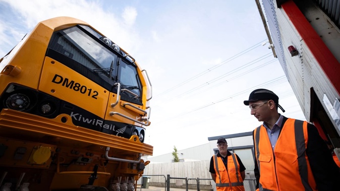 Transport Minister Simeon Brown seeing the first two of the new DM locomotives at KiwiRail’s Middleton depot in Christchurch. Photo / George Heard