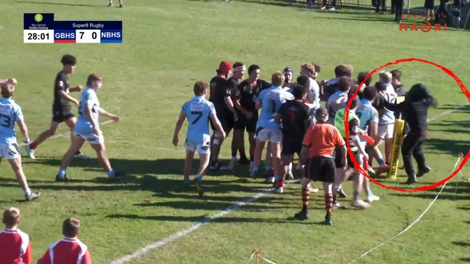 A hooded teen stormed the field during an altercation in a school rugby match and punched a player from Napier Boys' High School. Photo / Whakaata Māori