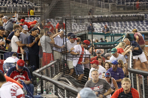 Fans leave their seats as a shooting took place outside Nationals Park during an MLB game in Washington, DC, on July 17. Photo / AP
