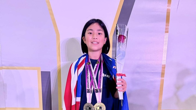 Ten-year-old Xiahan (Luna ) Lu won a gold medal at the Asian Youth Chess Championships in United Arab Emirates this month. Photo / Sandy Wren