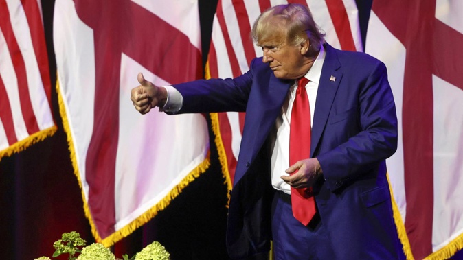 Former President Donald Trump gestures after speaking at a fundraiser event for the Alabama GOP. Photo / AP