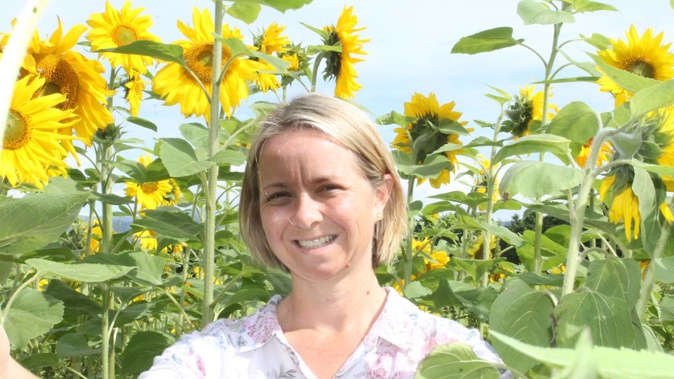 Charlotte Heald decided to grow sunflowers in her front paddock for people to enjoy, and to raise money to help prevent drownings. Photo / Leanne Warr