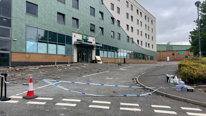 A view of destruction as volunteers and municipal teams clean up the damage around a hotel for asylum seekers targeted by far-right rioters in Rotherham, South Yorkshire, United Kingdom on August 05, 2024. Photo / Getty