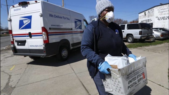 USPS said on its website that it was temporarily suspending international mail acceptance for a number of destinations. Photo / AP