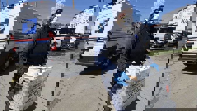 USPS said on its website that it was temporarily suspending international mail acceptance for a number of destinations. Photo / AP