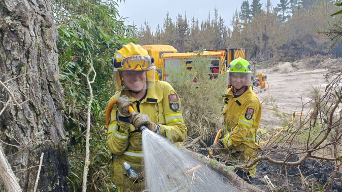 Firefighters continued working on Matakana Island until dark on Monday night. Photo / Supplied