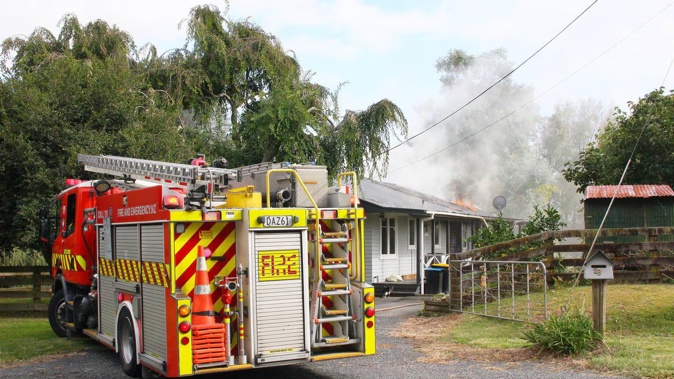 Fire and Emergency arrived at the scene to find the home well involved. Photo / Dean Taylor