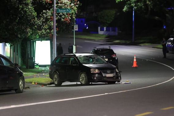 The black VW at the centre of the incident surrounded by evidence markers on Sunday evening in Half Moon Bay's Prince Regent Drive. Photo / Hayden Woodward