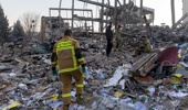 Firefighters work at the scene of an airstrike that destroyed shops and residences on March 2, 2026 in Tehran, Iran. Iran's Supreme Leader, Ayatollah Ali Khamenei, was confirmed killed after the United States and Israel launched a joint attack on Iran on February 28. Iran retaliated by firing waves of missiles and drones at Israel, and targeting U.S. allies in the region. (Photo by Majid Saeedi/Getty Images)