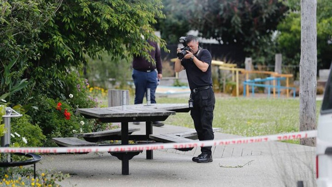Police had a section Opaketai Beach Haven garden taped off as they investigated the death. Photo / Dean Purcell