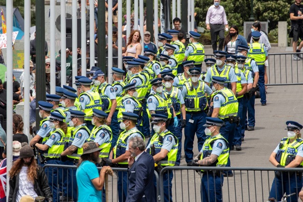 Police officers organising themselves on Parliament Forecourt during the anti-mandate protest occupation in Wellington. (Photo / Mark Mitchell)
