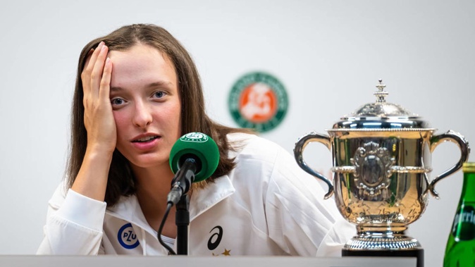 Iga Swiatek of Poland talks to the media after defeating Cori Gauff in the French Open final. Photo / Getty