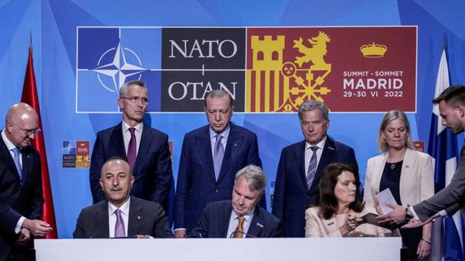 Nato Secretary-General Jens Stoltenberg, Turkish President Recep Tayyip Erdogan, Finland's President Sauli Niinisto, Sweden's Prime Minister Magdalena Andersson, Turkish Foreign Minister Mevlut Cavusoglu, Finnish Foreign Minister Pekka Haavisto, and Sweden's Foreign Minister Ann Linde. (Photo / AP)