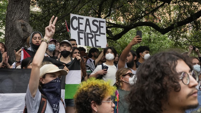 Students participate in a pro-Palestinian protest at the University of Texas, Wednesday, April 24, 2024, in Austin. (Jay Janner/Austin American-Statesman via AP)