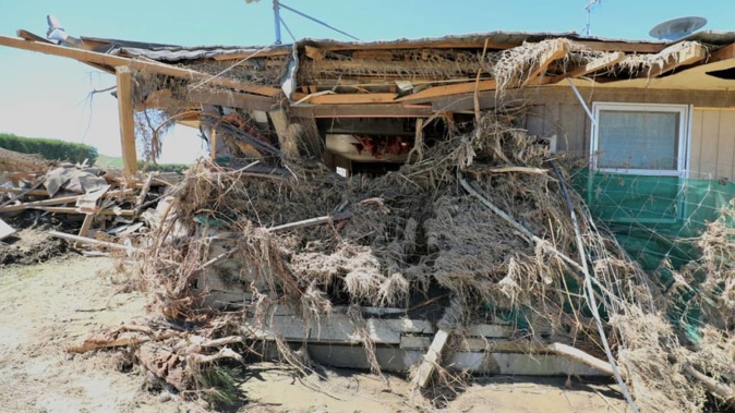 Emma Tuck's Dartmoor Rd home in Puketapu was destroyed in the flood. Photo / RNZ